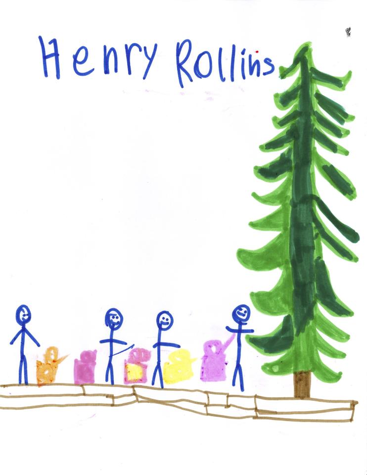 kid's drawing of a christmas tree and presents